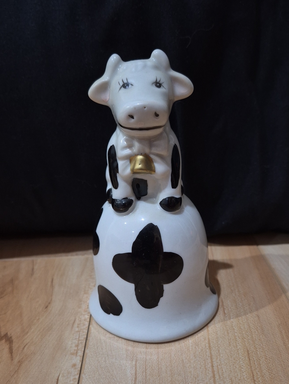 White and Black Cow Ceramic Bell with Gold Accent